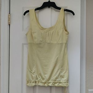 Yellow lululemon top with drawstring hem